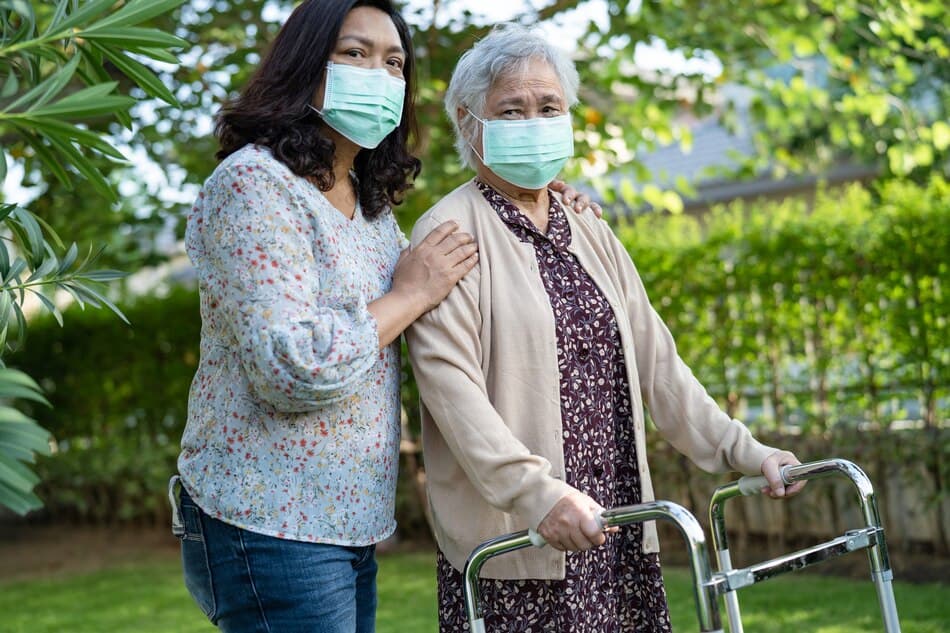 Helper with elderly lady